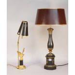 A Regency style ebonised wooden table lamp with gilt metal mounts on an octagonal base, with shade,