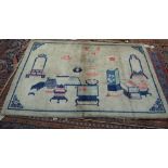 A Chinese pictorial rug, the fawn field with an interior room design in indigo corner design,