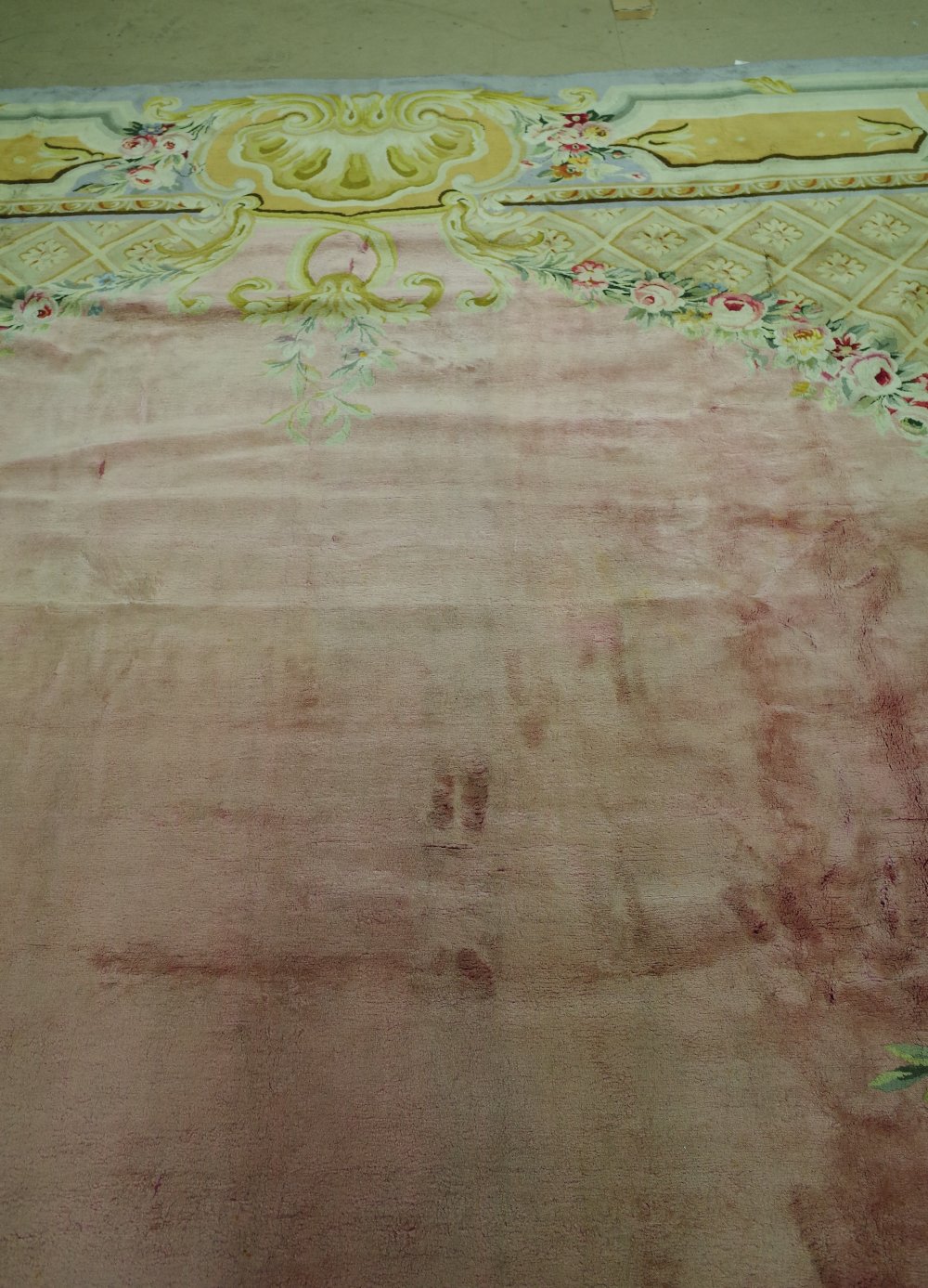 A Savonnerie carpet, French, the plain pale pink field with trellis spandrels and floral garlands, - Image 3 of 16
