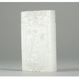 A Chinese white jade rectangular pendant, late 19th/20th century,