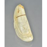 A late 19th century scrimshaw whale tooth detailed in black ink 'Last Voyage Oct 1882,