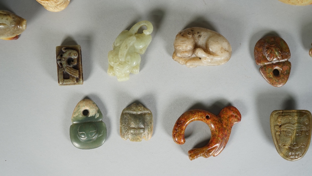 A group of Chinese archaistic jade carvings, of various colour and size, - Image 2 of 5