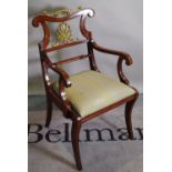 A Regency style mahogany open armchair with gilt metal back on sabre supports 55cm wide x 90cm high