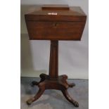 A George III style rosewood teapoy on tapering column and four outswept supports,