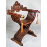 A 19th century carved walnut 'X' frame chair,