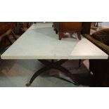 A modern marble topped rectangular dining table on wrought iron base,
