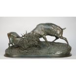 After Pierre Jules Mene, (French 1810-1879) a bronze group of rutting stags, signed to the cast 'P.