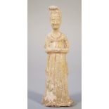 A Chinese pottery figure of a lady, Tang dynasty,