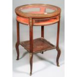 A Louis XVI style gilt metal mounted mahogany vertu table,