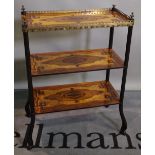 A 19th century continental mahogany and specimen wood inlaid three tier etagere with brass