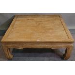 A 20th century Chinese limed oak square coffee table, 107cm wide x 41cm high.