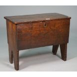 A small 17th century oak five plank coffer, on slab end supports, 54cm wide x 44cm high.