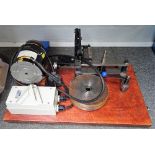 A Chronos wheel-cutting machine With five steel discs,