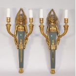 A pair of Empire style figural two branch wall appliques, 20th century,