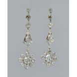 A pair of diamond set pendant cluster earrings,