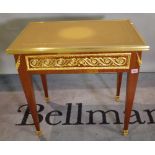 A Regency style stained beech gilt metal mounted single drawer low side table with brown leather