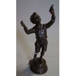 A 20th century bronze figure of a boy holding a bird, 22cm high.