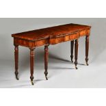 In the manner of Gillows; a George IV mahogany serving table,