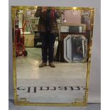 A 20th century brass framed wall mirror 108cm x 82cm.