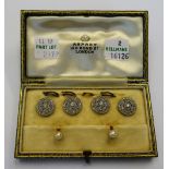 A set of four French platinum and diamond set dress buttons,