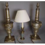 A pair of 20th century silvered metal table lamps with lion mask handles,