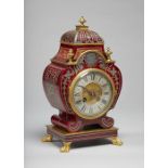 A French ormolu-mounted tortoiseshell and pewter-inlaid mantel clock In the Regence style,