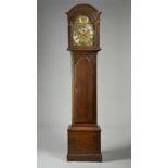An oak longcase clock The movement by Thomas Brass, Guildford,