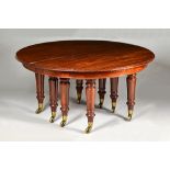 An unusual mid-19th century mahogany dual extending dining table,