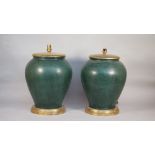 A pair of modern green pottery table lamps,