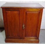 A late Victorian mahogany side cupboard with panelled doors, 76cm wide x 90cm high.