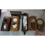 A group of 19th century and later mahogany and oak wall clocks, (a.f.).