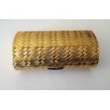 A Kutchinsky London 9ct gold cigarette case, of oval form,
