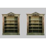 A pair of Baroque revival green painted floor standing open bookcases,