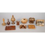 Treen collectables, including; a burr walnut cigarette case dated 1936, another smaller similar,