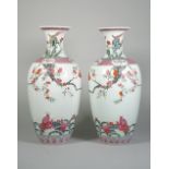 A pair of Chinese famille-rose vases, 19th century,