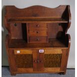 An early 20th century mahogany hanging cupboard,