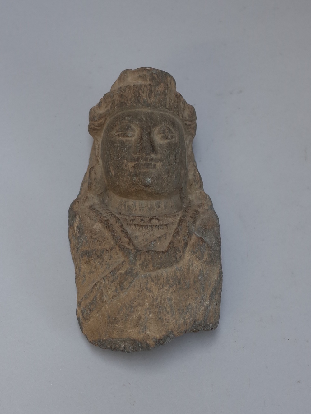 A small Gandhara sandstone bust of Buddha, 3rd/4th century,