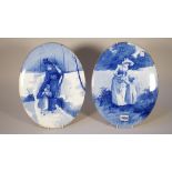 A pair of large Doulton Burslem `Blue Children' oval plaques, circa 1900,