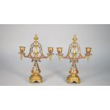 A pair of French champlevé brass twin branch candelabra, late 19th century,