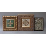 Two gilt framed ecclesiastical panels of a cross, 26cm wide x 26cm high and 28cm wide x 27cm high,