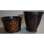 An 18th century leather fire bucket with painted Coat of Arms 34cm high and another.