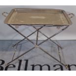 A large silver plated rectangular tray on folding 'X' frame stand, 81cm wide x 61cm high.