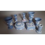 A group of Wedgwood blue jasper, 20th century, mostly sprigged with classical figures,