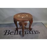 A mid-20th century Indian carved sandalwood occasional table,