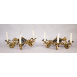 A pair of Empire style three light wall appliques, modern green painted brass,