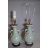 A pair of 20th century celadon glazed vase converted to lamps, 35cm high, (2).