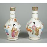 A pair of Canton famille-rose bottle vases, 19th century,