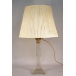 A modern perspex and gilt metal mounted table lamp of Corinthian column form,
