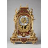 A Fine French ormolu-mounted, boulle and cut brass-inlaid mantel clock In the Regence style,