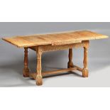 Heals; a limed oak kitchen table,